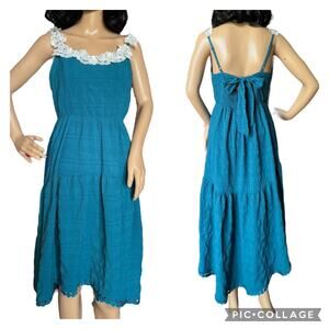 Daisy tiered smocked open back with bow high low dress size medium